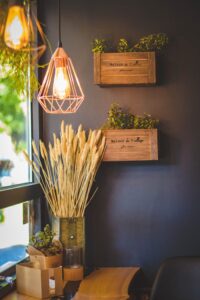 Cozy indoor space with rustic decor, warm lighting, and natural elements.