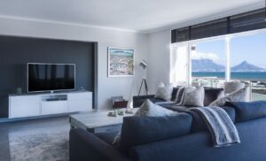 Stylish living room with a view of Table Mountain, blending modern design with natural beauty.